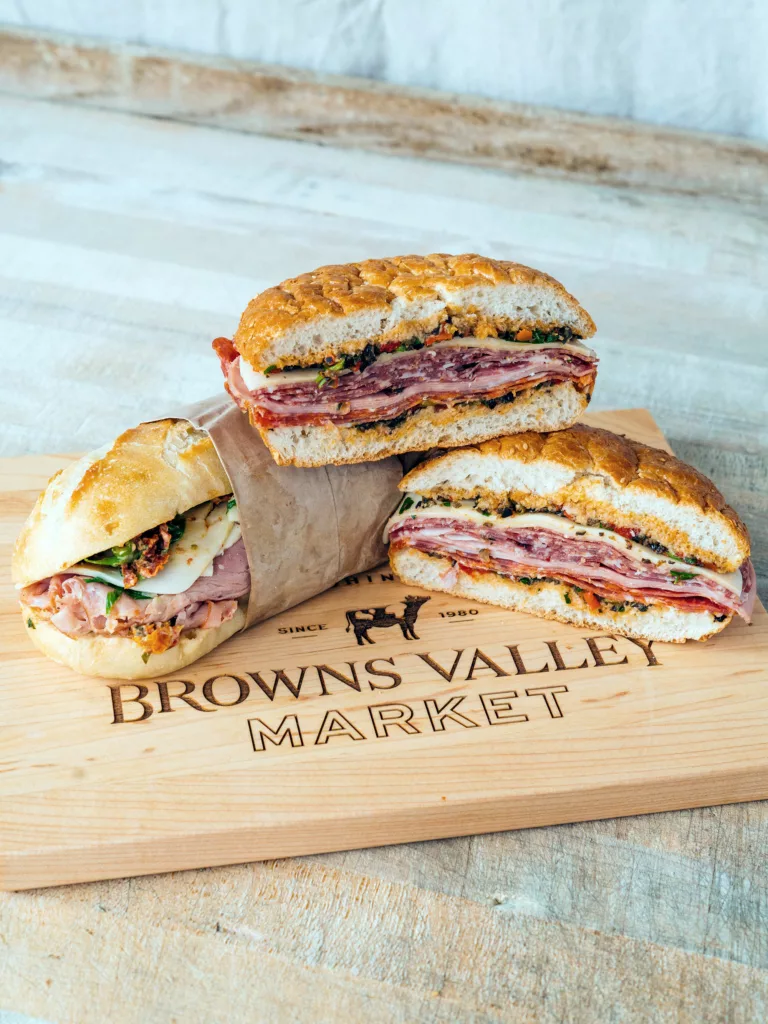 Handmade sandwiches made with in-house ingredients, sliced deli meats, and freshly baked breads