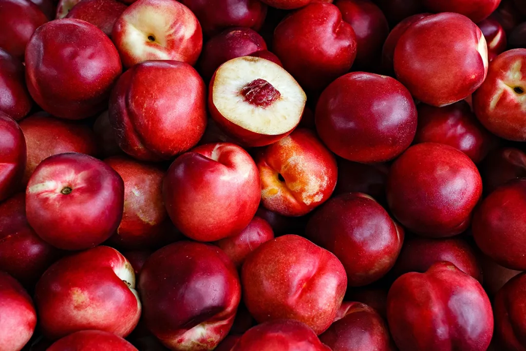 peaches, a stone fruit that is in season in Napa supermarkets during the summer months